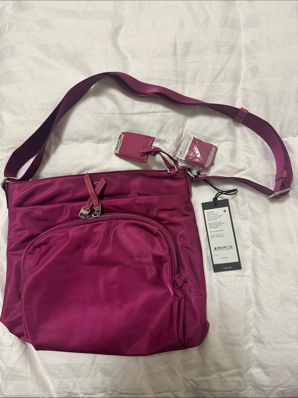 Tumi Women's Crossbody Bag in Deep Fuchsia Pink